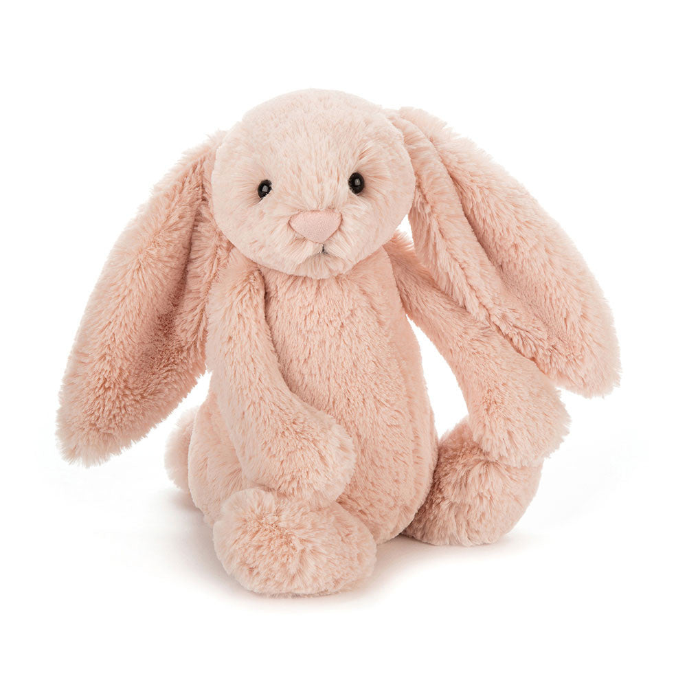Vorderansicht: Jellycat Bashful Blush Bunny – sitzender Kuschelhase in sanftem Blush-Ton mit langen Hängeohren und besonders weichem Fell.