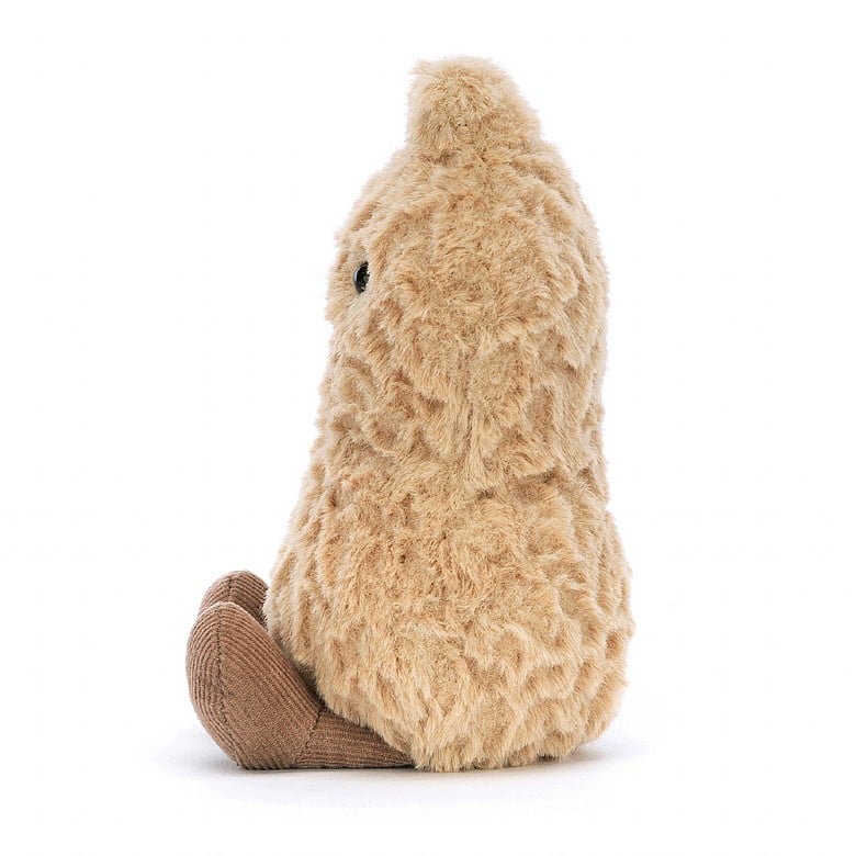 Seitenansicht: Jellycat Amuseables Peanut Kuscheltier mit freundlichem Gesicht und kleinen Beinchen in Erdnussform