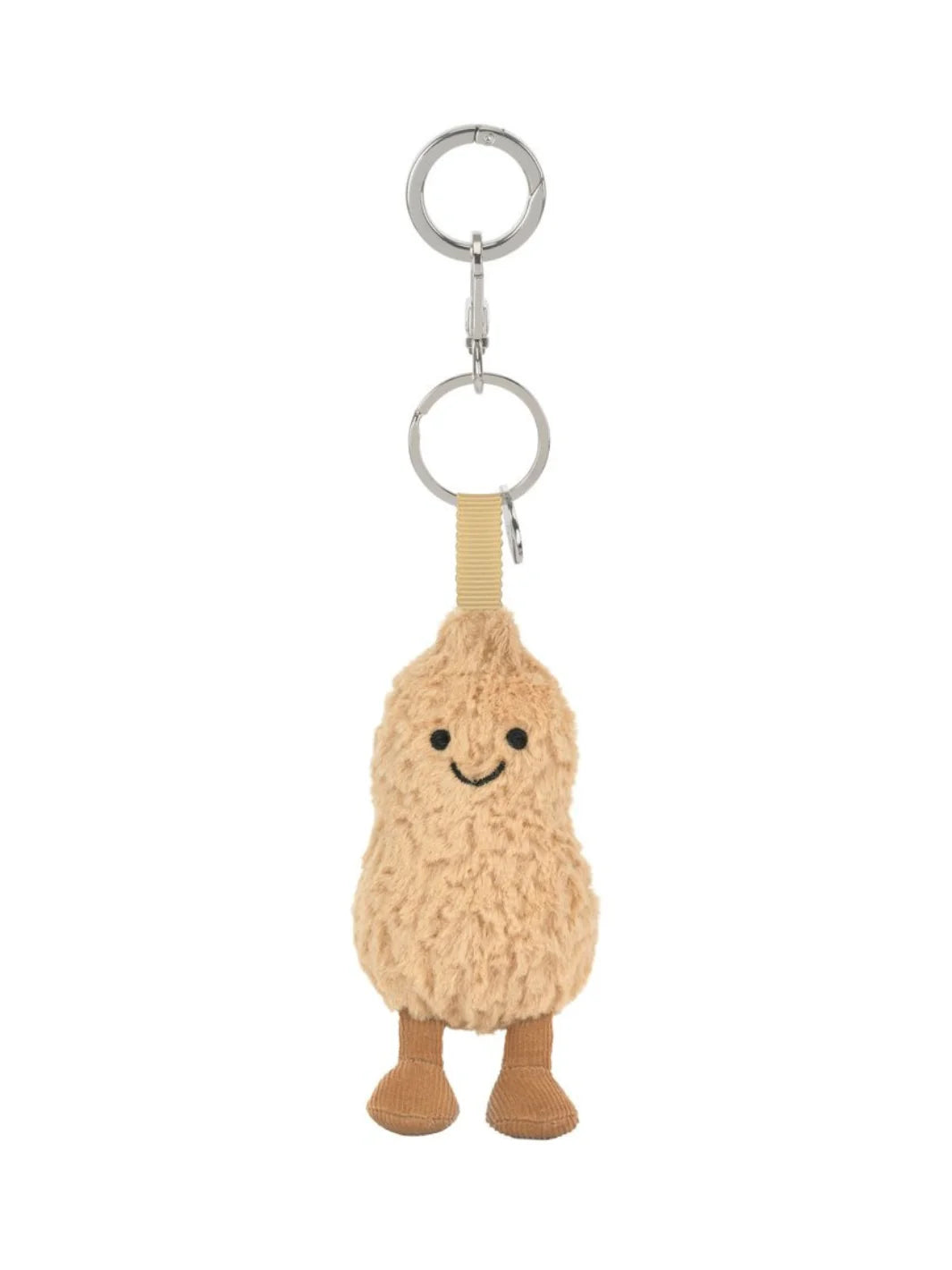 Jellycat Amuseables Peanut – kuscheliger Erdnuss Schlüssel- und Taschenanhänger mit kleinen Beinchen, lächelndem Gesicht und silbernem Befestigungsring, von vorne.