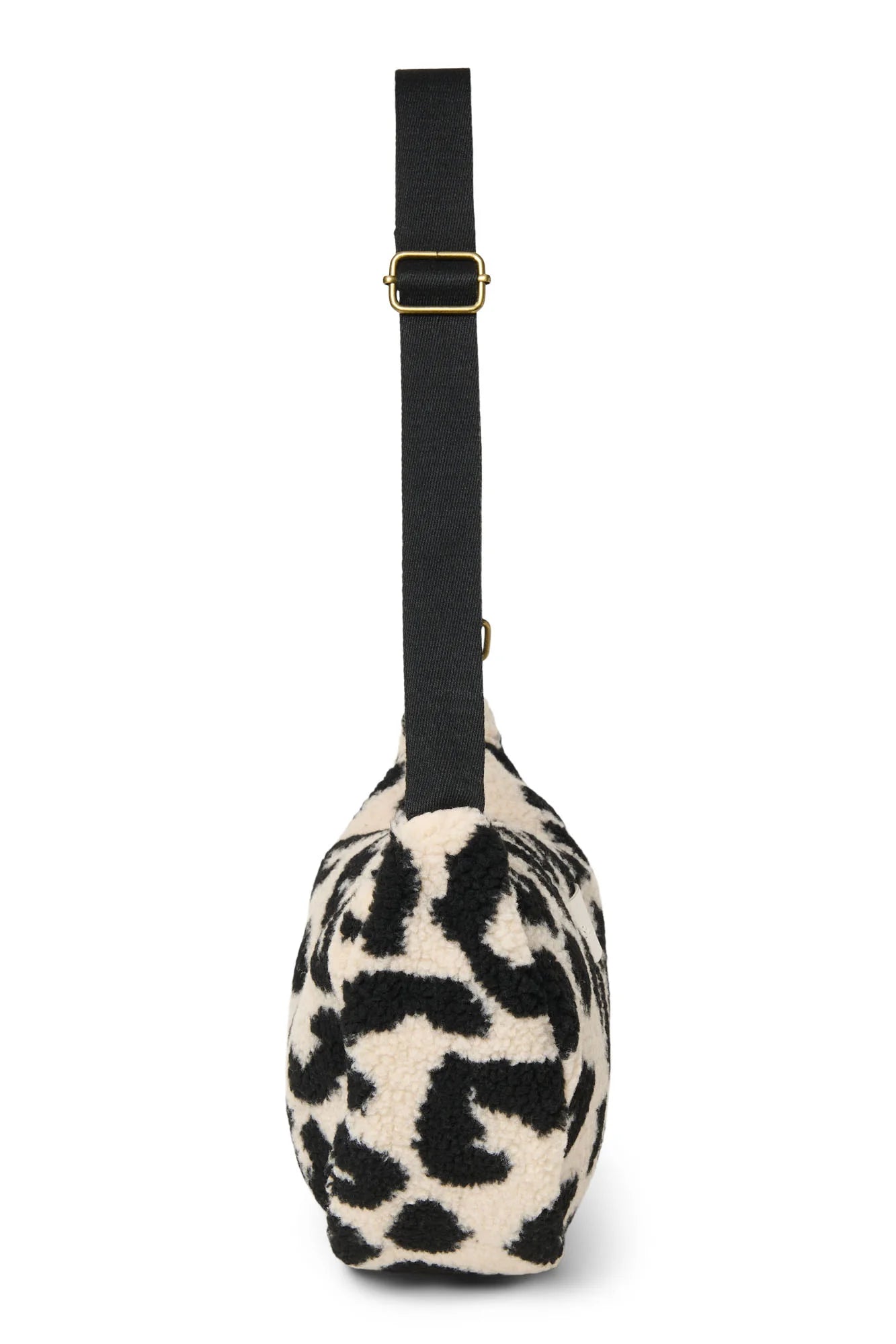 Crossbody Bag für Erwachsene aus Teddystoff im Kuhflecken Design von Studio Noos. Jede Tasche ist ein Unikat.