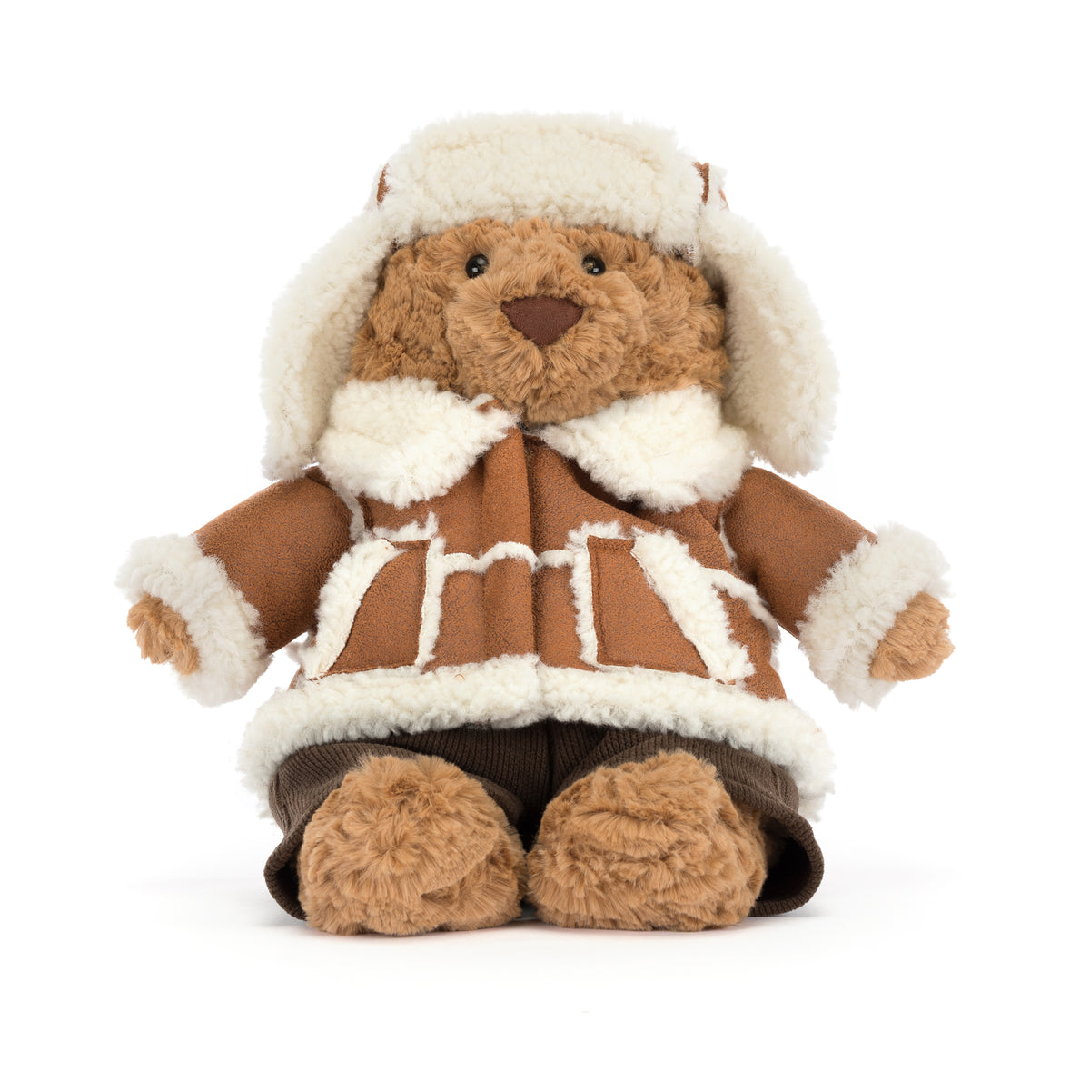 Jellycat Bartholomew Bear Alpine – brauner Kuschelbär mit Pilotenmütze und brauner Winterjacke mit cremeweißem Fellbesatz, von vorne.
