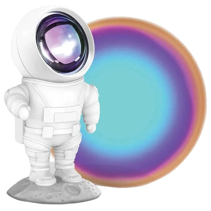 Der kleine Astronaut von MOB strahlt Regenbogenfarben an die Wand.