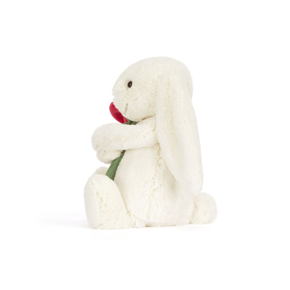 Jellycat Bashful Cream Bunny with Rose, ein cremefarbener Plüschhase mit rosa Stoffrose – ideal als Geschenk zum Valentinstag oder Geburtstag