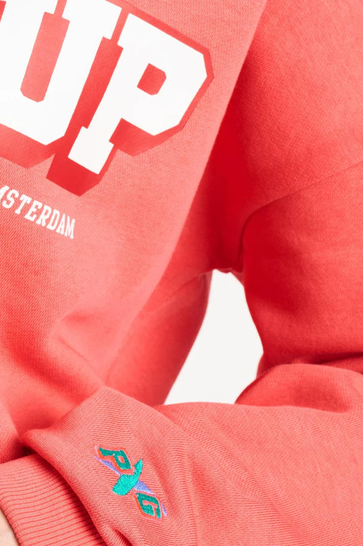 Orange Sweatshirt TEAM UP von POM AMSTERDAM mit weißem Print, sportlich-lässiger Look Vibe