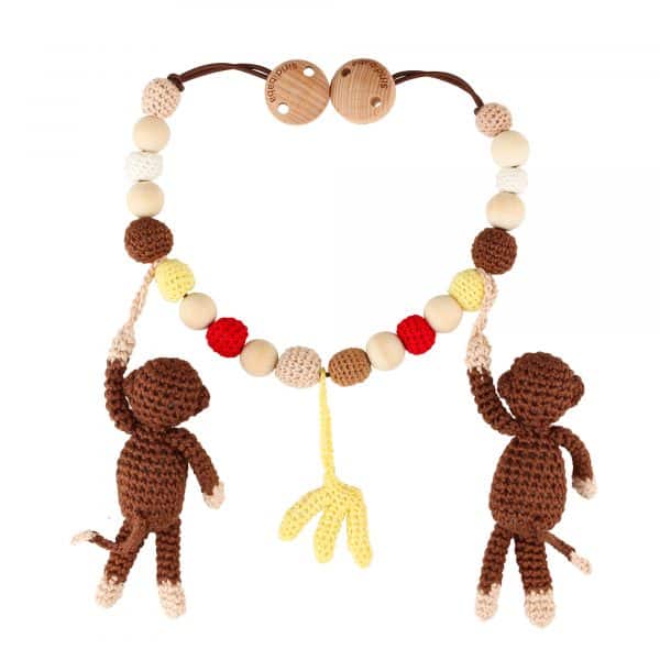Kinderwagenkette von Sindibaba mit gehäkelten Affen.