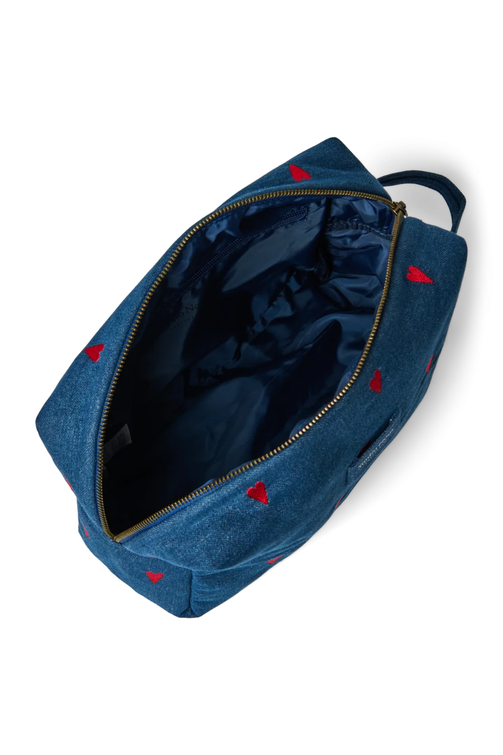 Innenansicht der Studio Noos Denim Kosmetiktasche mit dunkelblauem, glänzendem Futter
