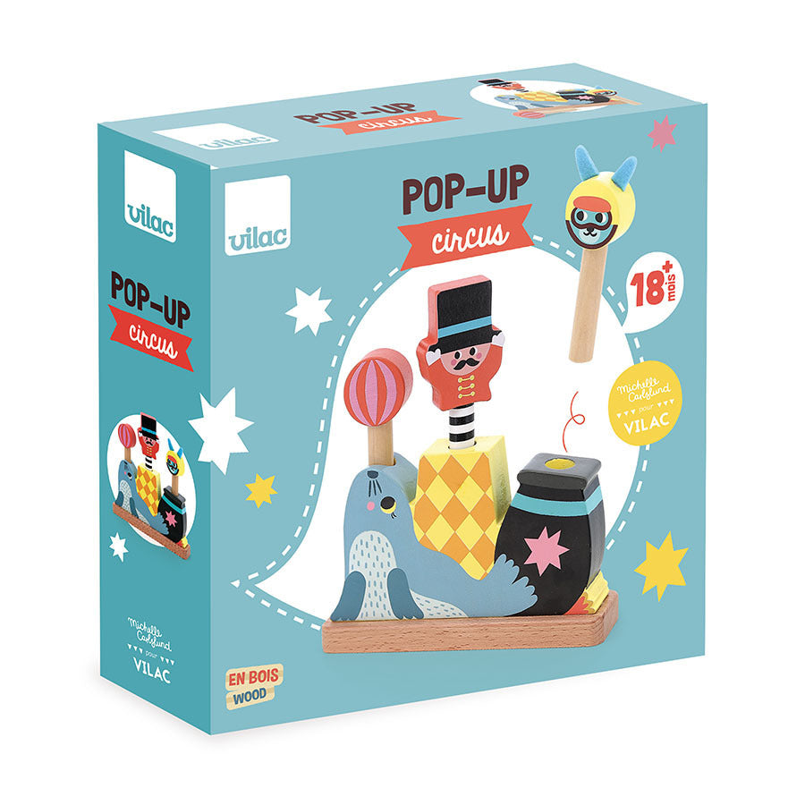 Verpackung des Vilac Pop-up Circus mit Zirkusmotiv von Michelle Carlslund