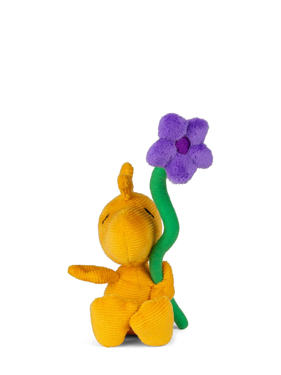 Woodstock der kleine gelbe Vogel aus der Comicserie Die Peanuts als Kuscheltier.