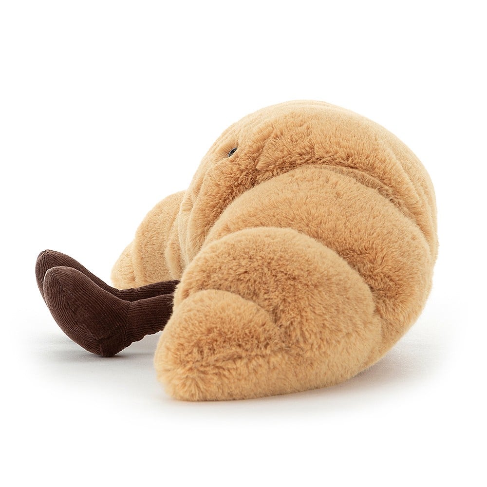 Jellycat Amuseables Croissant, kleines Croissant aus Plüsch mit Füßchen und Lackgesicht