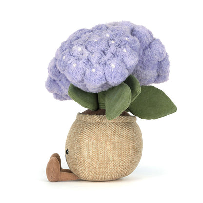 Jellycat Amuseables Hydrangea - Plüsch-Hortensie in lila/violett im braunen Topf mit lächelndem Gesicht und ausgestreckten Füßen