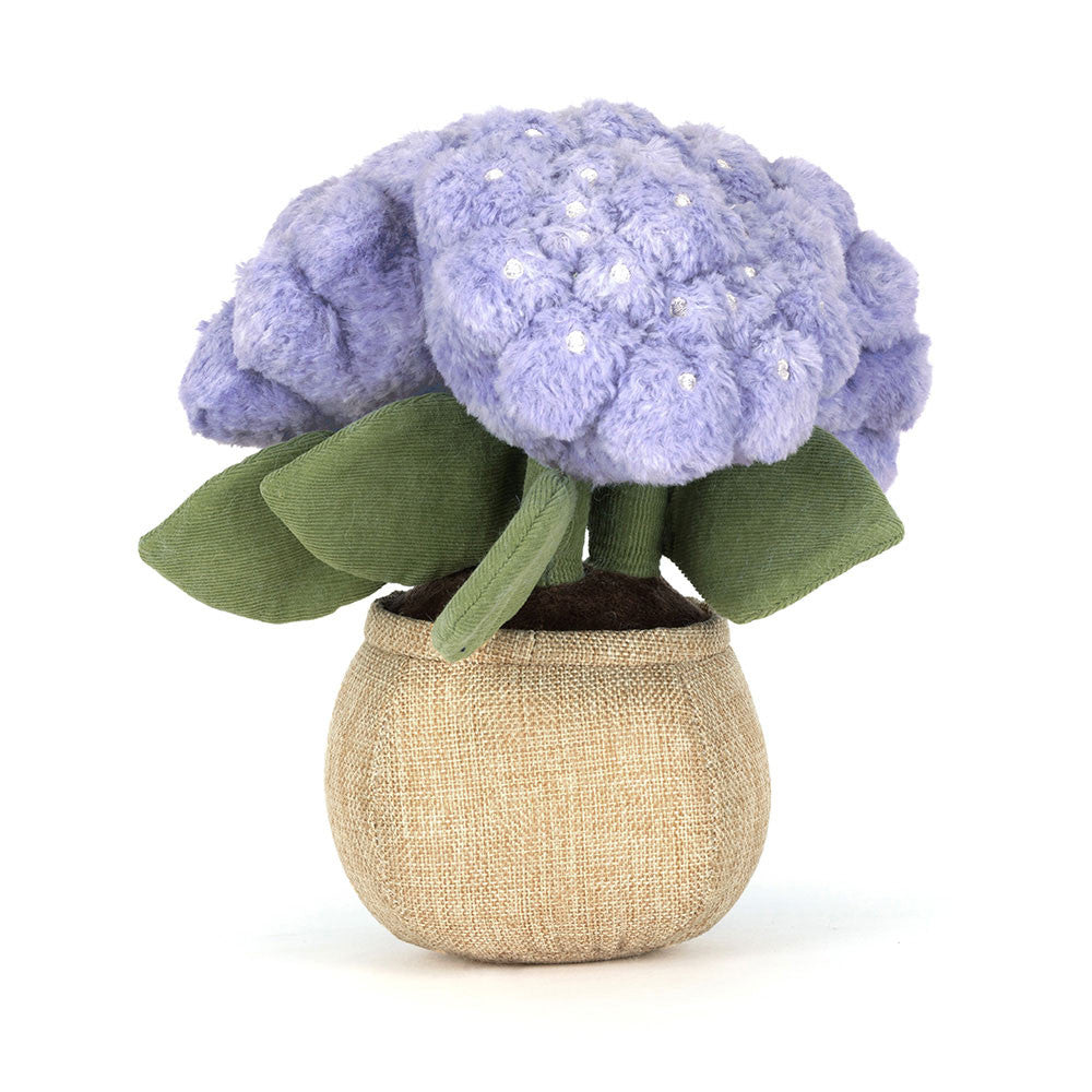 Jellycat Amuseables Hydrangea - Plüsch-Hortensie in lila/violett im braunen Topf mit lächelndem Gesicht und ausgestreckten Füßen