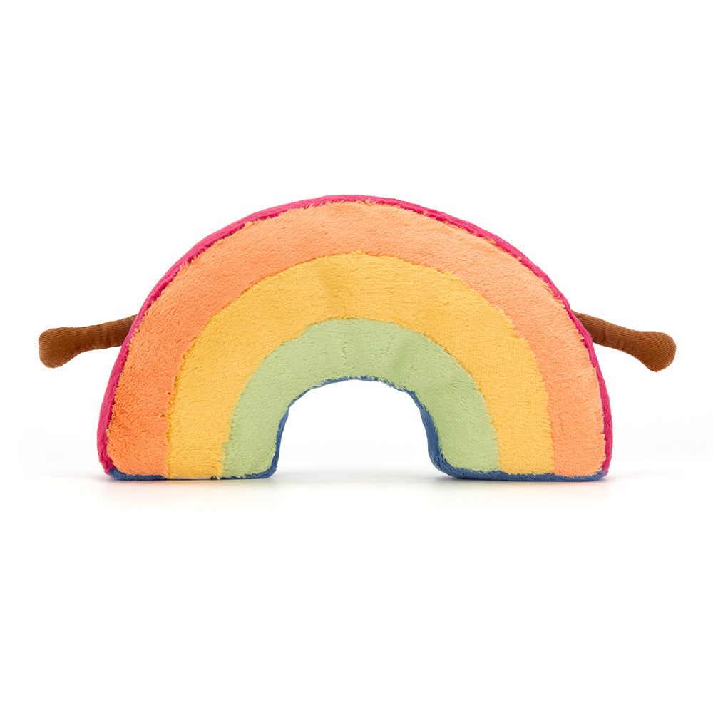 Rückansicht: Jellycat Amuseables Rainbow – stehender Regenbogen aus Plüsch mit bunten Farben, lachendem Gesicht, schwarzen Knopfaugen und braunen Ärmchen.