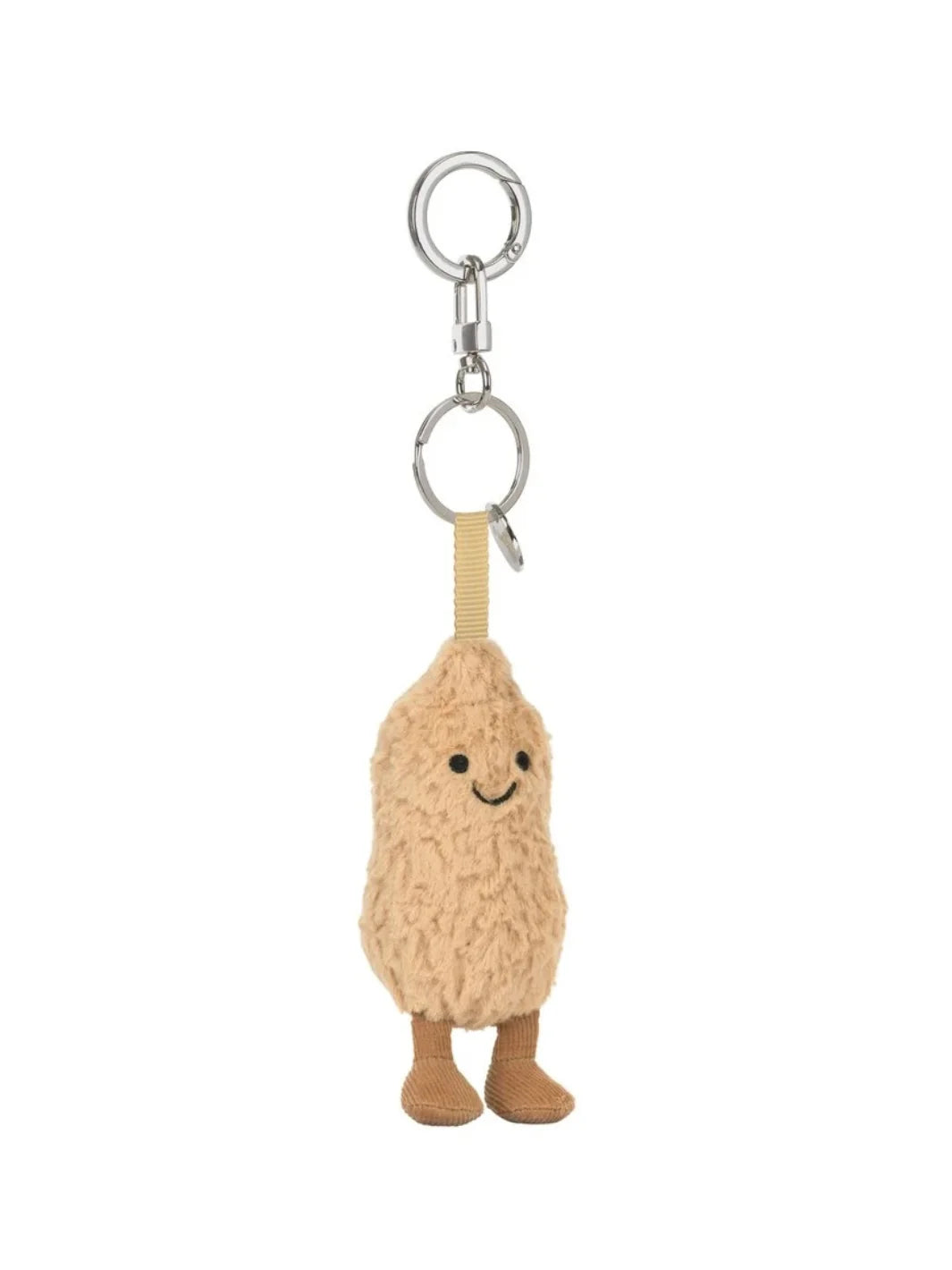 Jellycat Amuseables Peanut – kuscheliger Erdnuss Schlüssel- und Taschenanhänger mit kleinen Beinchen, lächelndem Gesicht und silbernem Befestigungsring, von vorne.