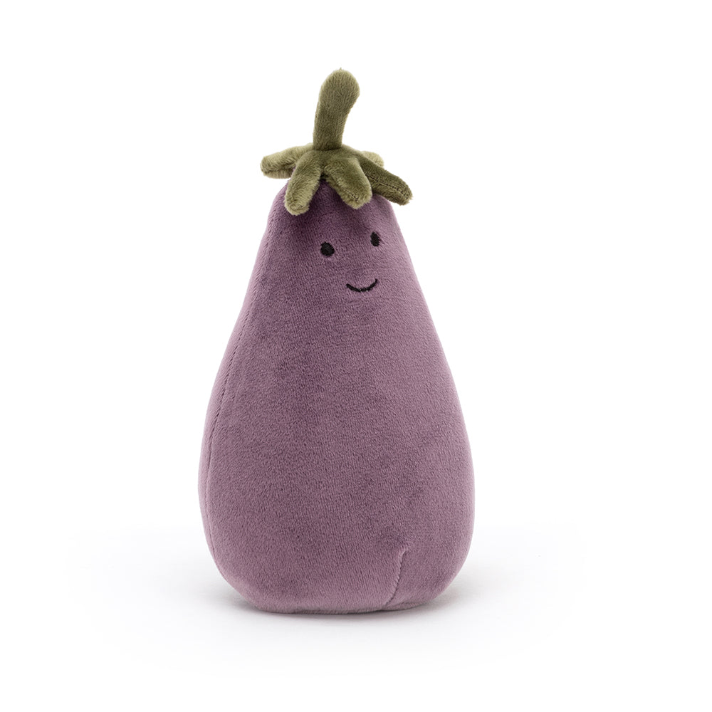 Vorderansicht: Jellycat Amuseables Aubergine – lila Kuscheltier-Aubergine mit lachendem Gesicht, schwarzen Knopfaugen und grünem Blätterkranz am oberen Ende.