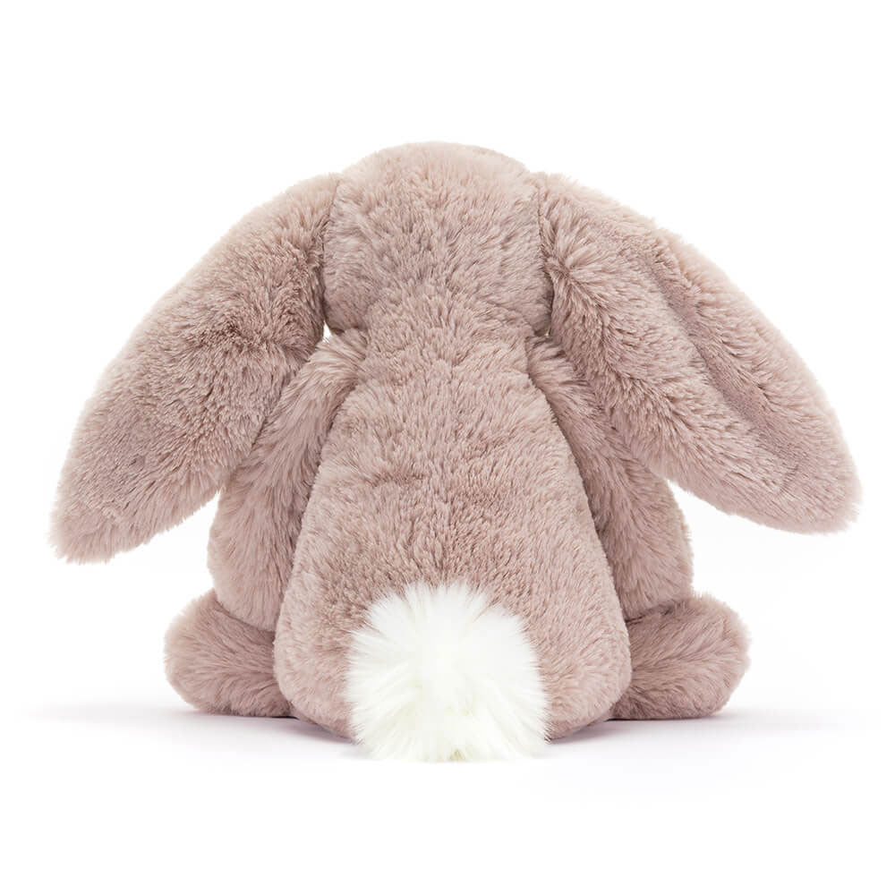 Rückansicht: Jellycat Bashful Luxe Bunny Rosa Kuschelhase in zartem Rosa mit langen Hängeohren, schimmernder Nase und flauschigem Schwänzchen