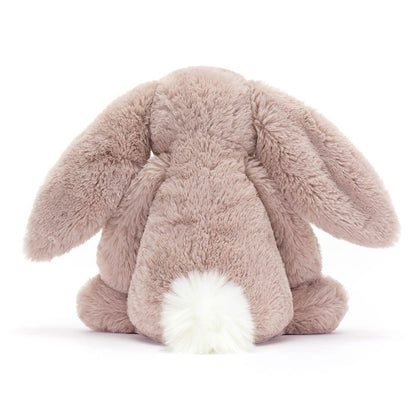 Rückansicht: Jellycat Bashful Luxe Bunny Rosa Kuschelhase in zartem Rosa mit langen Hängeohren, schimmernder Nase und flauschigem Schwänzchen