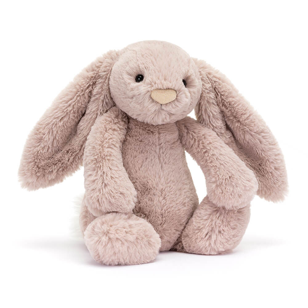 Vorderansicht: Jellycat Bashful Luxe Bunny Rosa Kuschelhase in zartem Rosa mit langen Hängeohren, schimmernder Nase und flauschigem Schwänzchen
