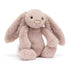 Vorderansicht: Jellycat Bashful Luxe Bunny Rosa Kuschelhase in zartem Rosa mit langen Hängeohren, schimmernder Nase und flauschigem Schwänzchen