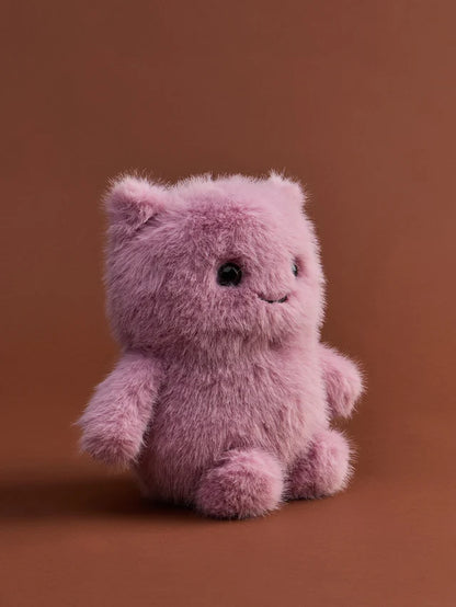 Bon Ton Toys Glimpy ECO 25 cm aus der Kollektion The Moods – lilafarbenes, flauschiges Plüschtier mit kleinem, zufriedenen Lächeln, aus recycelten Materialien.