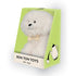 Kleiner weißer Reginald Plüschhund von BON TON TOYS sitzt in Geschenkbox