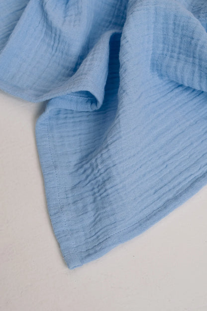 Swaddles von Studio Noos. Super weiches Stilltuch, Pucktuch oder Wickelunterlage aus Biobaumwolle. 