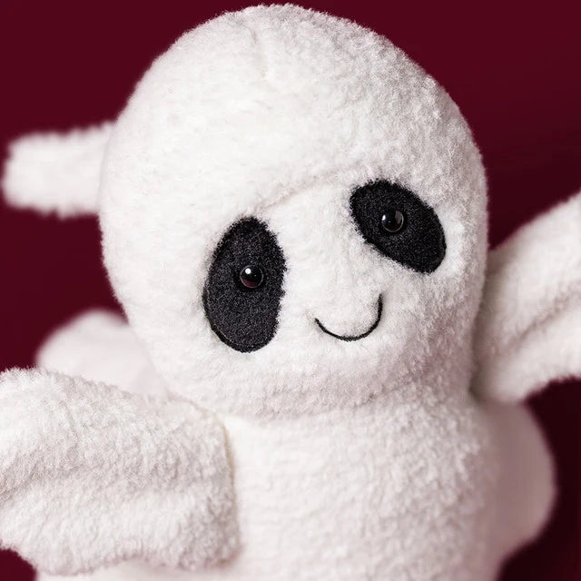 Detailansicht vom Lachgesicht und den schwarz umrandeten Augen des Jellycat Ghost Bob