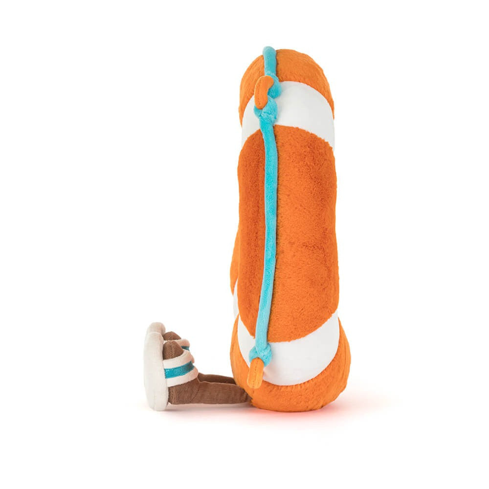 Seitenansicht: Jellycat Amuseables Lifering Kuscheltier in Form eines Rettungsrings mit fröhlichem Gesicht und kleinen Beinchen.