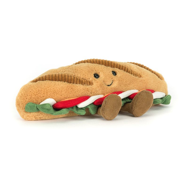 Jellycat Amuseables „Caprese Baguette“ lächelndes Plüsch-Baguette mit Füßchen, belegt mit Tomaten, Mozzarella, Basilikum