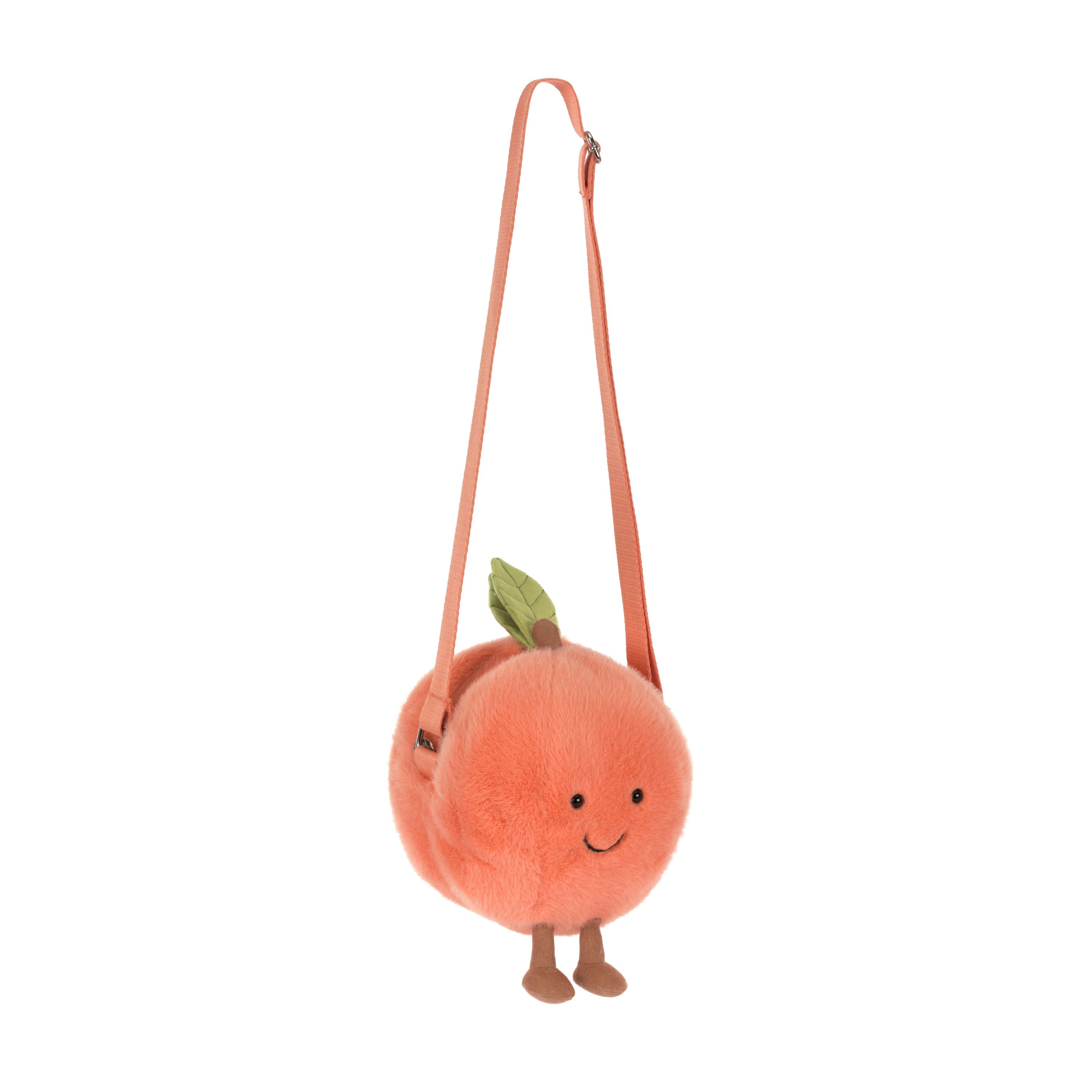 Jellycat Amuseables Peach Shoulder Bag als flauschige Pfirsich-Tasche mit Gesicht und Schulterriemen