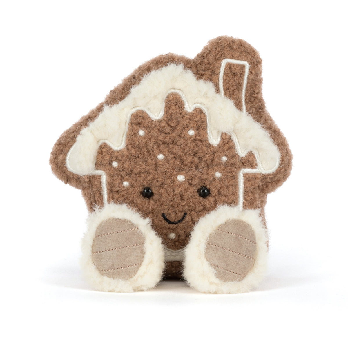 Jellycat Amuseables Molasi Cookie – flauschiger brauner Keks in Form eines Lebkuchenhauses mit weißem Zuckerguss, kleinen Verzierungen, lächelndem Gesicht und cremefarbenen Füßchen, von vorne.