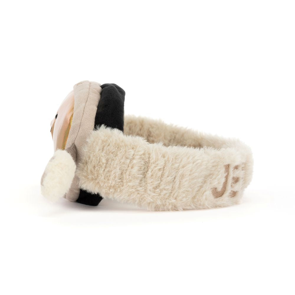 Jellycat Amuseables Sports Ski Goggles – kuschelige Skibrille mit golden schimmernden Gläsern, beigefarbenem Rahmen und kleinen Armen, von der Seite.