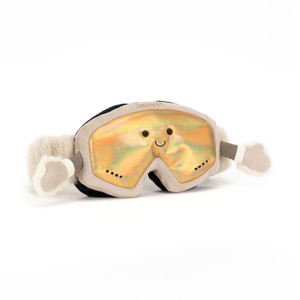 Jellycat Amuseables Sports Ski Goggles – kuschelige Skibrille mit golden schimmernden Gläsern, beigefarbenem Rahmen, lächelndem Gesicht und kleinen Armen, von vorne.