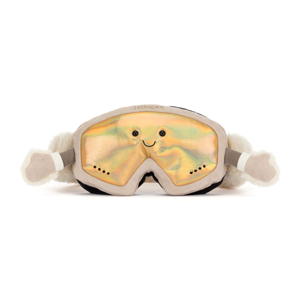 Jellycat Amuseables Sports Ski Goggles – kuschelige Skibrille mit golden schimmernden Gläsern, beigefarbenem Rahmen, lächelndem Gesicht und kleinen Armen, von vorne.