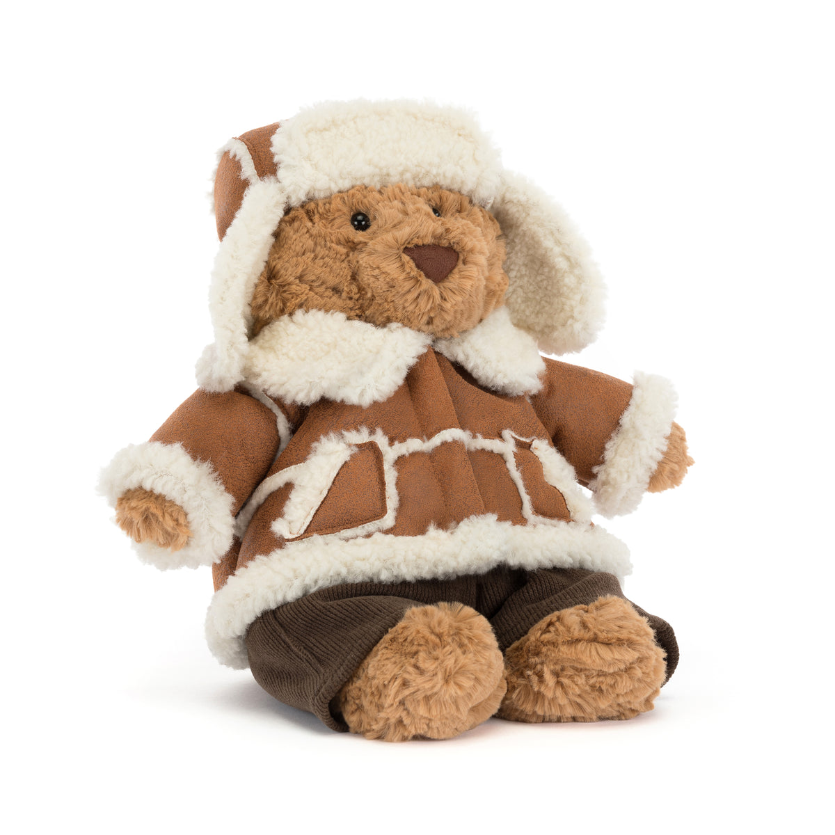 Jellycat Bartholomew Bear Alpine – brauner Kuschelbär mit Pilotenmütze und brauner Winterjacke mit cremeweißem Fellbesatz, von vorne.