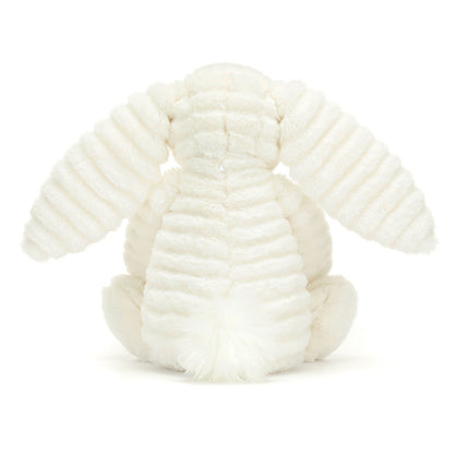 Rückansicht: Jellycat Bashful Luxe Bunny Nimbus, weißer Plüschhase mit leicht welligem Fell, langen Hängeohren, rosa Näschen und extra flauschigem Puschelschwänzchen