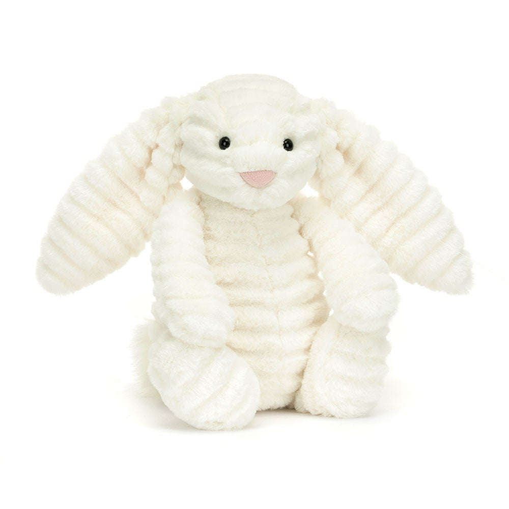 Vorderansicht: Jellycat Bashful Luxe Bunny Nimbus, weißer Plüschhase mit leicht welligem Fell, langen Hängeohren, rosa Näschen und extra flauschigem Puschelschwänzchen
