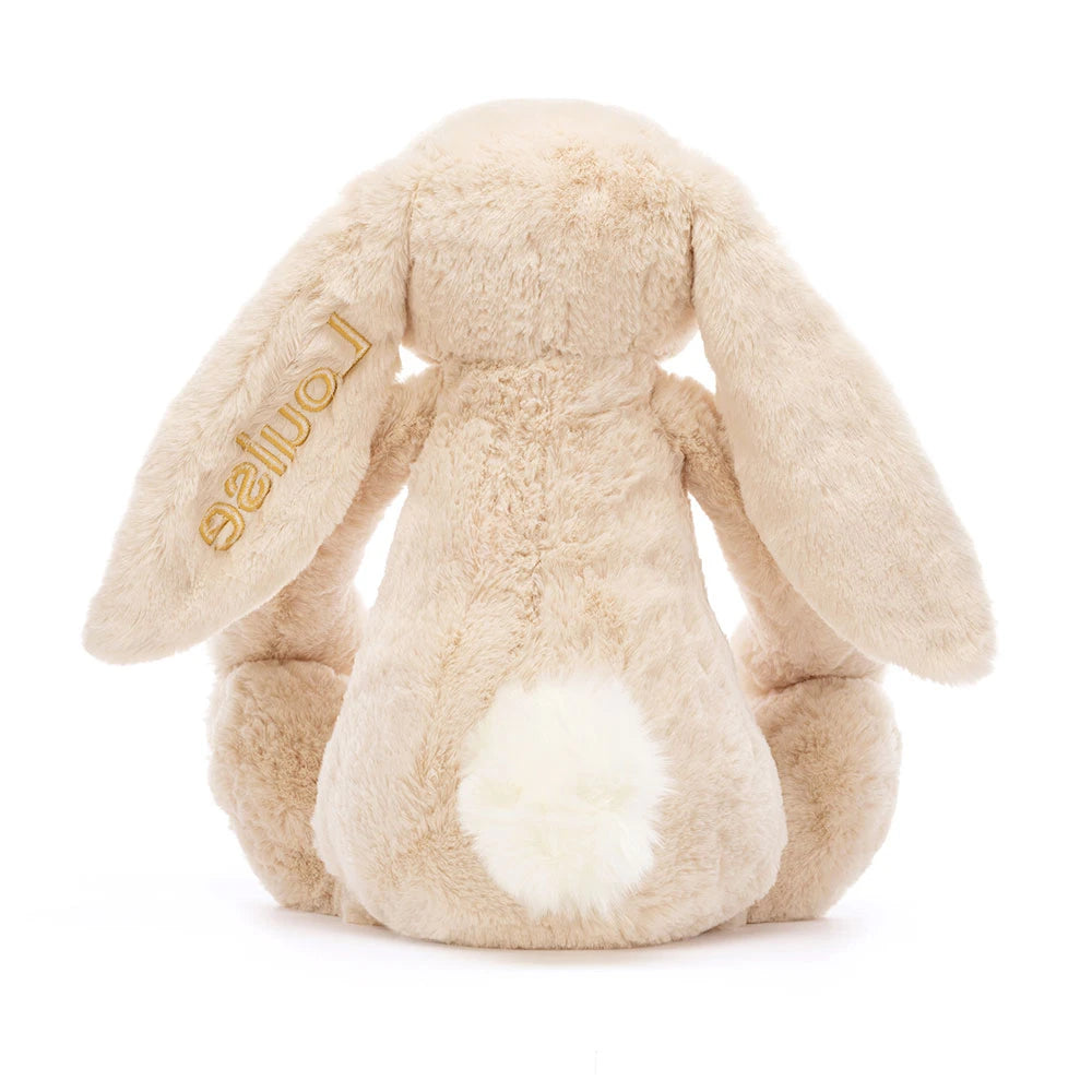 Rückansicht: Jellycat Bashful Luxe Bunny Willow Kuschelhase in Creme-Beige mit langen Hängeohren und flauschigem, weißen Schwänzchen