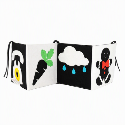 Baby Faltbuch Farbfunken schwarz weiß mit Farbakzenten aus Filz Jolly Designs