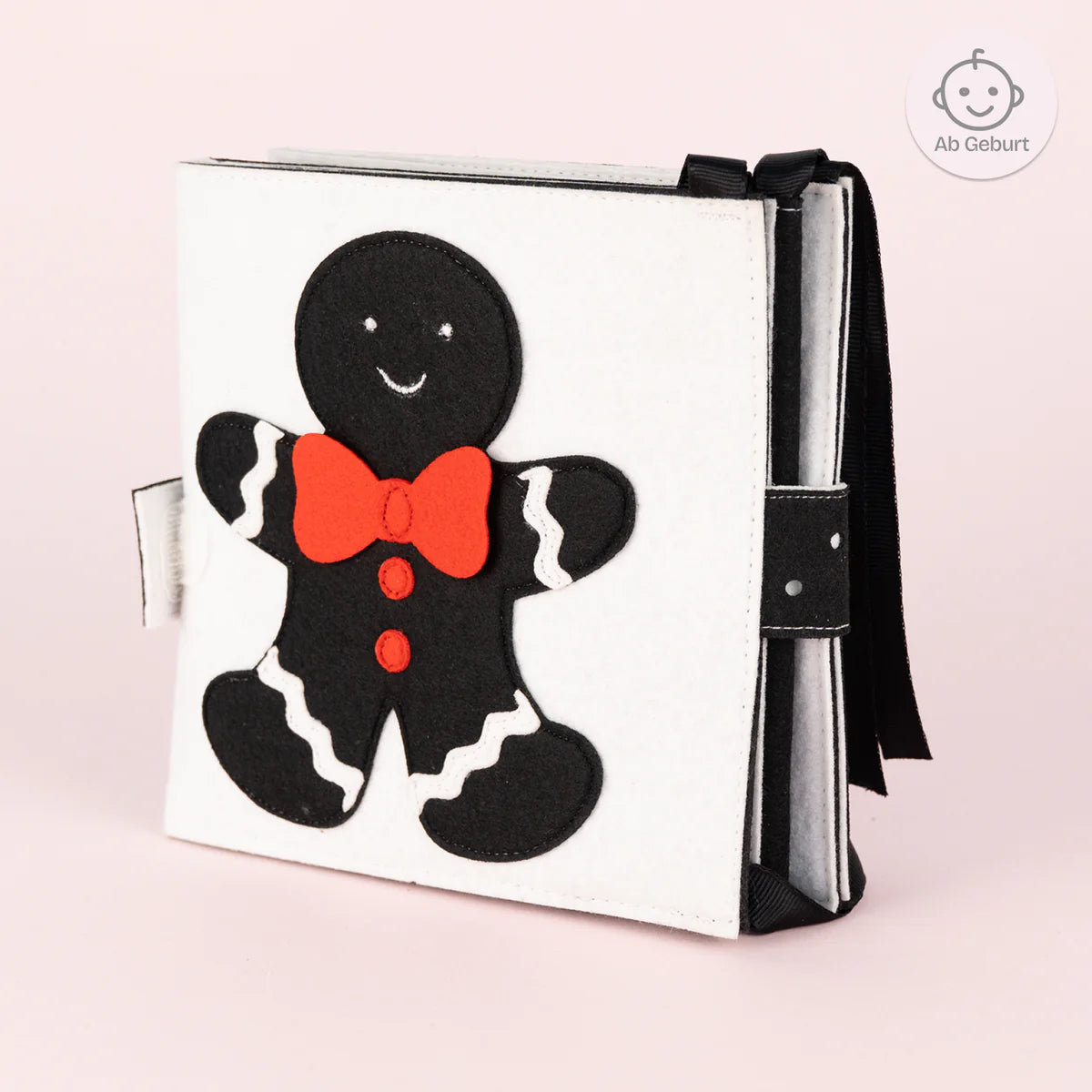Baby Faltbuch Farbfunken schwarz weiß mit Farbakzenten aus Filz Jolly Designs