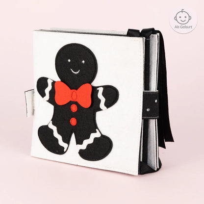 Baby Faltbuch Farbfunken schwarz weiß mit Farbakzenten aus Filz Jolly Designs