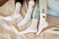 Socken von My Day My Dream. Mit aufgestickter Brezel.
