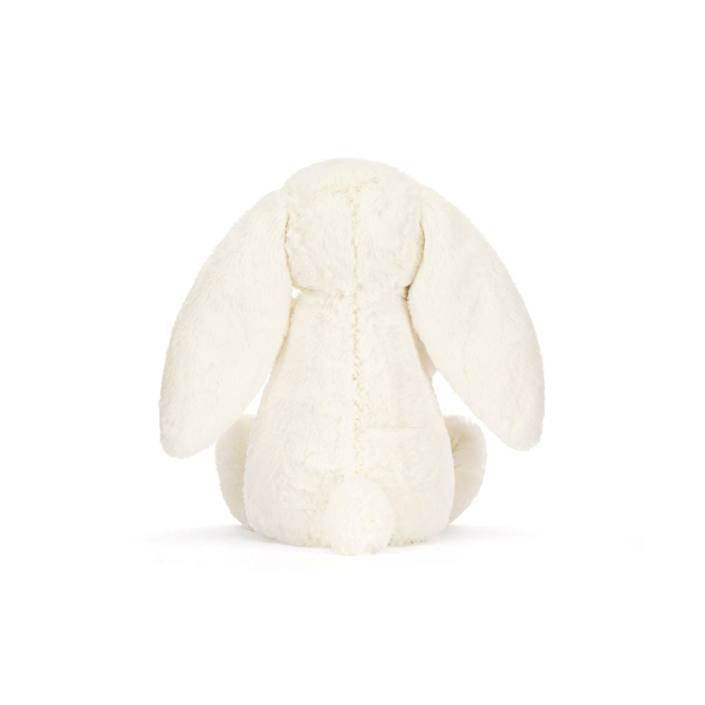 Jellycat Bashful Cream Bunny with Rose, ein cremefarbener Plüschhase mit rosa Stoffrose – ideal als Geschenk zum Valentinstag oder Geburtstag