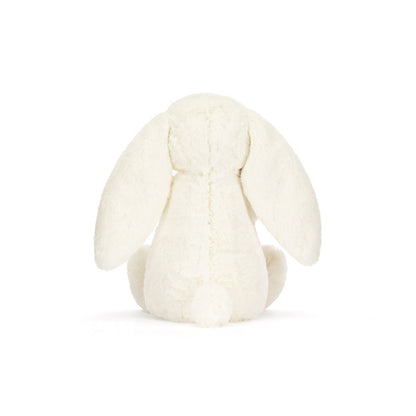 Jellycat Bashful Cream Bunny with Rose, ein cremefarbener Plüschhase mit rosa Stoffrose – ideal als Geschenk zum Valentinstag oder Geburtstag