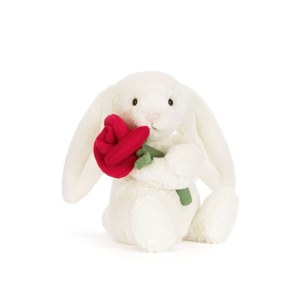 Jellycat Bashful Cream Bunny with Rose, ein cremefarbener Plüschhase mit rosa Stoffrose – ideal als Geschenk zum Valentinstag oder Geburtstag