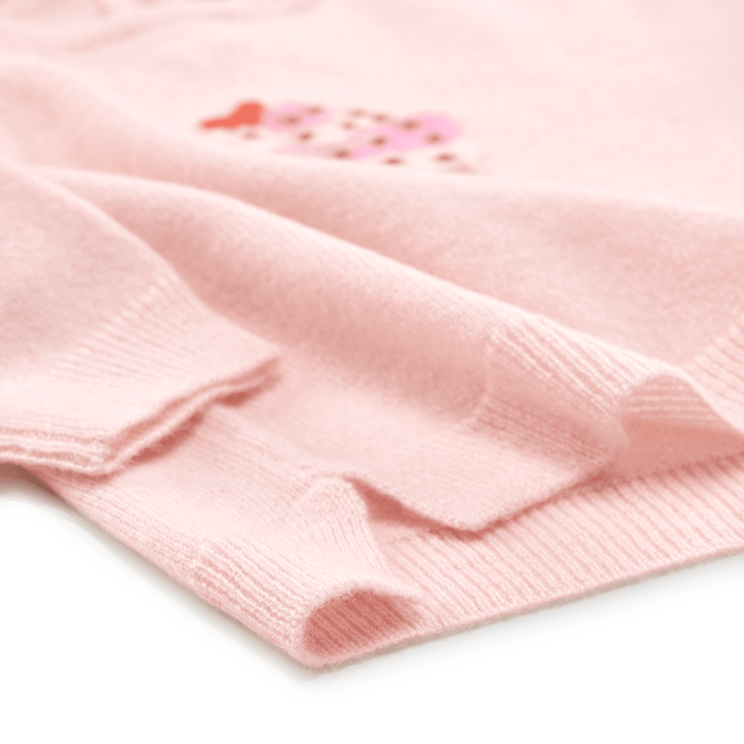 Detailansicht der Seitenschlitze am PAPA LOBSTER Kaschmir Pullover CUPCAKE Rosa