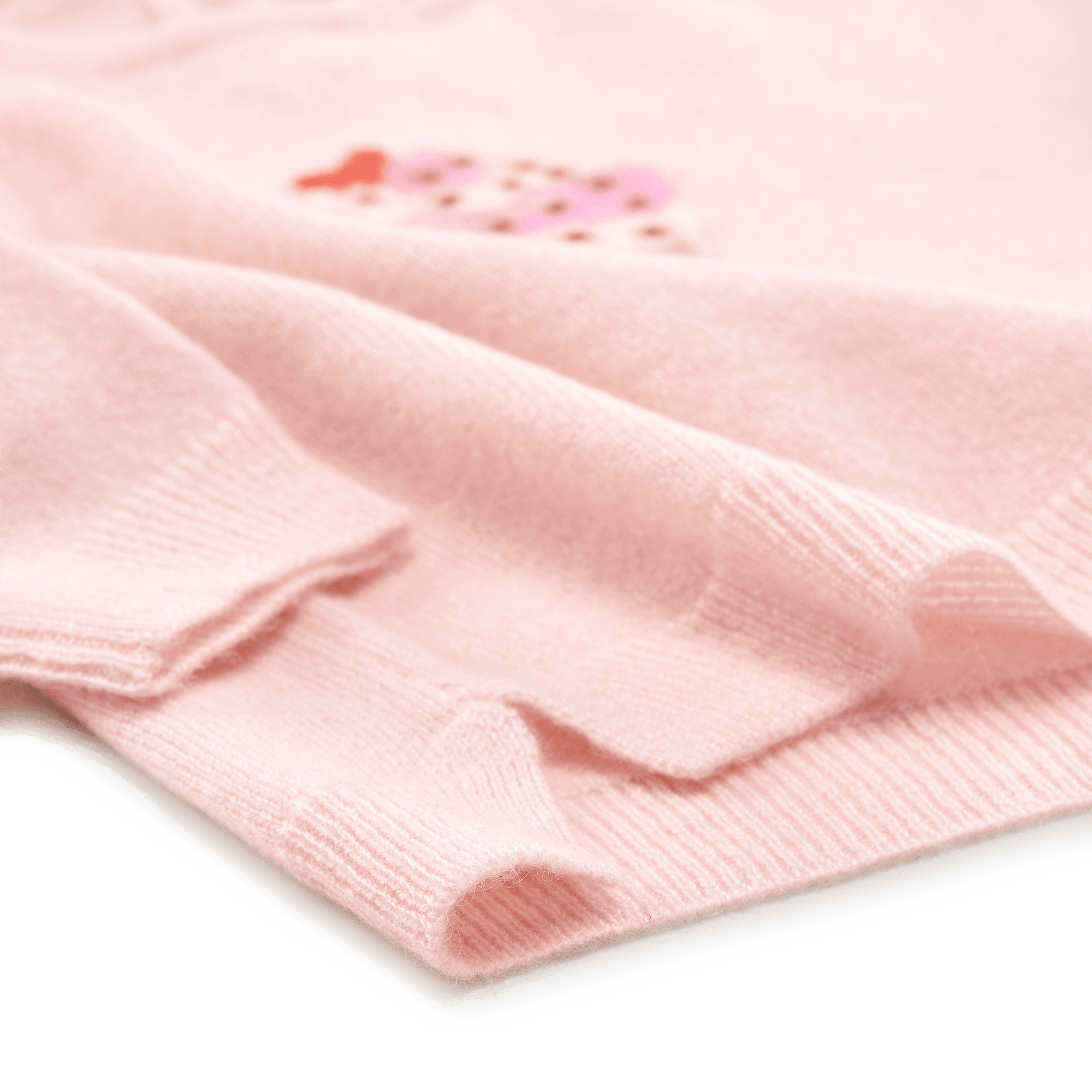Detailansicht der Seitenschlitze am PAPA LOBSTER Kaschmir Pullover CUPCAKE Rosa