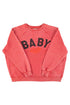 Sisters Department Sweatshirt "Baby" in einem ausgewaschenen Rot und aus 100% Bio-Baumwolle