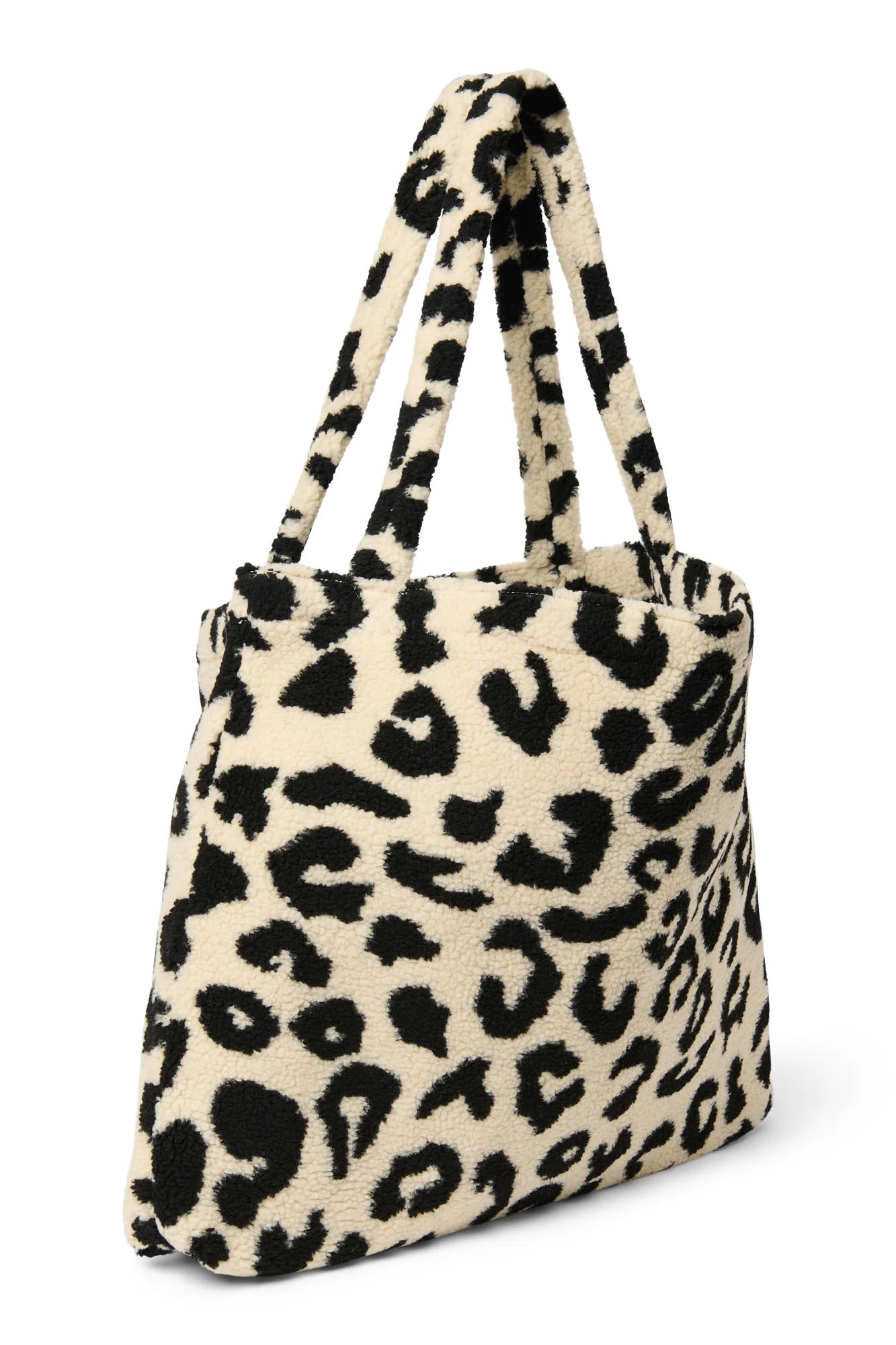 Studio Noos "Holy Cow Teddy Mom Bag". Henkeltasche aus Teddyplüsch mit Kuhfleckenmuster