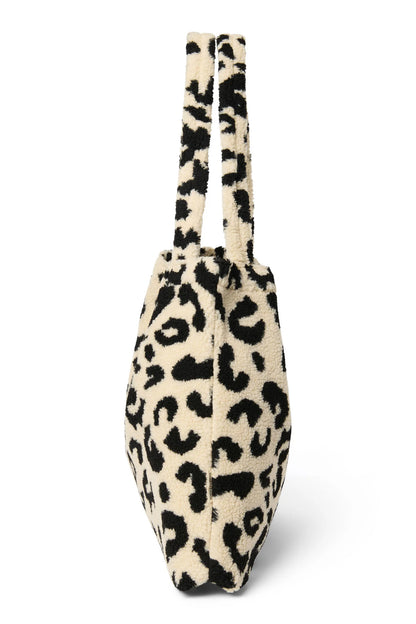 Studio Noos "Holy Cow Teddy Mom Bag". Henkeltasche aus Teddyplüsch mit Kuhfleckenmuster