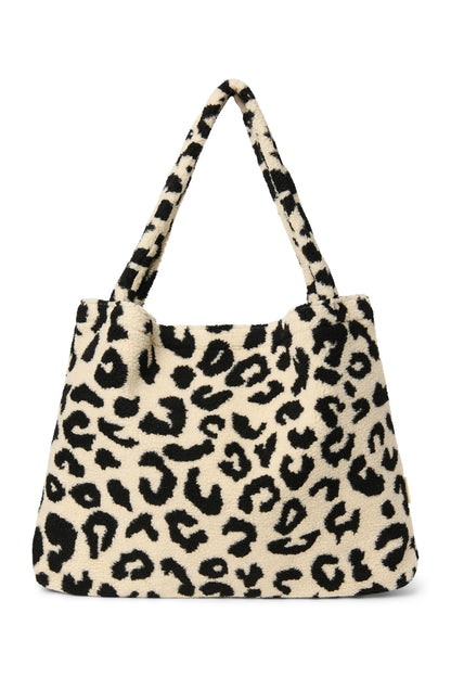 Studio Noos "Holy Cow Teddy Mom Bag". Henkeltasche aus Teddyplüsch mit Kuhfleckenmuster